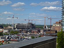 Construction over the West Don Lands in 2013. The area was one of the first neighbourhoods to be developed by Waterfront Toronto. Construction in the West Don Lands, 2013 06 03 A (2).JPG