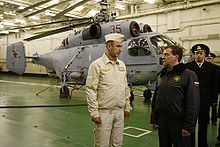 President Dmitry Medvedev inside the hangar of Admiral Kuznetsov, behind is the Kamov Ka-27 helicopter