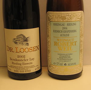 The bottle on the left displays: Producer (Dr. Loosen) - vintage - village (Bernkastel) and vineyard (Lay) - variety (Riesling) and Pradikat (Eiswein) - mandatory information in small print - alcoholic strength, region (Mosel-Saar-Ruwer) and volume.

The bottle on the right uses a slightly different order: Region (Rheingau) and variety (Riesling) - vintage - village (Kiedrich) and vineyard (Grafenberg) - Pradikat (Auslese) - producer (Weingut Robert Weil) - volume and alcoholic strength. Dr Loosen and Robert Weil wine bottles.jpg