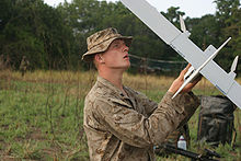 A marine checks a DE-903 UAV DragonEye-903.jpg