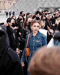 Chamberlain attends the Louis Vuitton show at Paris Fashion Week in 2021. Emma Chamberlain at '21 Paris Fashion Week - 51756578881.jpg