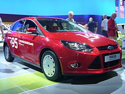 Front of prototype Series3 Ford Focus ECOnetic, showing closed lower grill and aerodynamic hubcaps on thinner low-resistance Michelin tyres Ford Focus ECOnetic.jpg