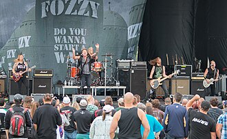 Kennedy was featured on the Fozzy track "Nameless Faceless" in 2005. Fozzy at FoF.jpg