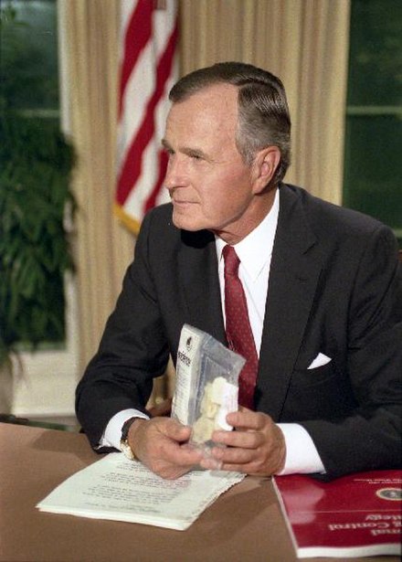 President George H. W. Bush holds up a bag of crack cocaine during his Address to the Nation on National Drug Control Strategy