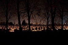 Lithuanian cemetery at All Souls night Ginkunu kapines 2010 velines 02.jpg