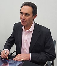 Holby City actor Guy Henry appears as Henrik Hanssen in the crossover event, and then again in the series finale. Guy Henry (cropped).jpg