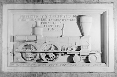 Commemorative Stone in the Washington Monument presented by the employees of the Norris Locomotive Works on Feb. 22, 1856 (Washington's Birthday). The 4-4-0 locomotive depicted bears the name Washington on its nameplate. HABS - Norris Locomotive Works stone at the Washington Monument (cropped).jpg