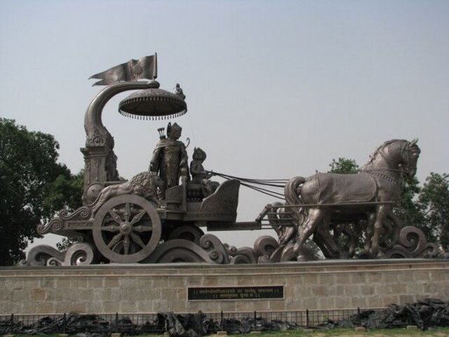 Modern bronze sculpture of Chariot with Krishna and Arjuna during the Kurukshetra War.