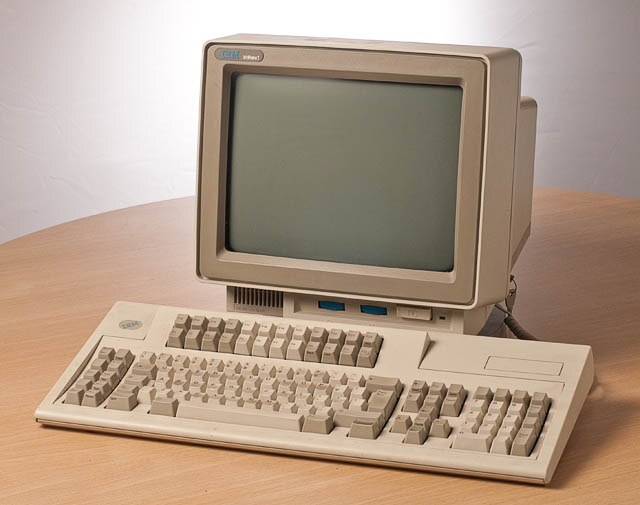 IBM 3486 Terminal, a later terminal with 5250 functionality, capable of supporting two independent sessions concurrently, and with an amber screen. Th