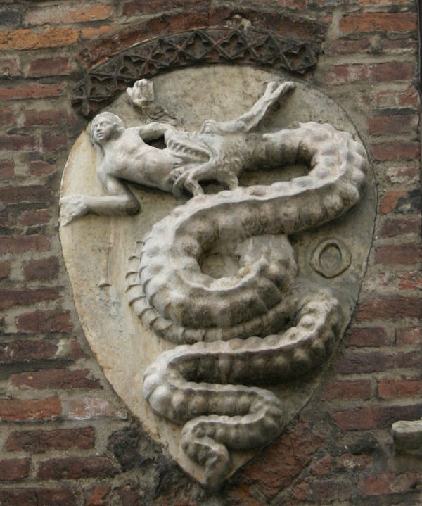 The House of Visconti coat of arms on the Archbishops' palace in Piazza Duomo bearing the initials (IO.<HANNES>) of the name of Archbishop Giovanni Vi