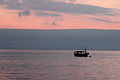 Israel Sunrise and ship, Sea of Galilee (15602213684).jpg