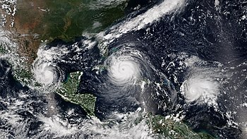 Three simultaneous hurricanes active on September 8, with Katia (left), Irma (center), and Jose (right), the first such occurrence since 2010. All three were threatening or affecting land at the time. Katia, Irma, Jose 2017-09-08 1745Z-1935Z.jpg
