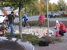 People and candles in front of Kauhajoki School of Hospitality (in Kauhajoki, Finland) one day after a school shooting in 2008. Kauhajoen koulusurma 28.jpg