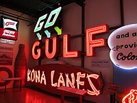 A sample of the display within the American Sign Museum in 2014 includes signs for Gulf Oil and Kona Lanes. Kona Lanes ASM 2014.JPG