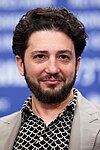 John Magaro interprète Ray