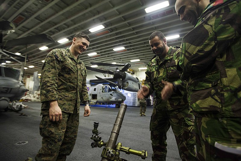 File:Marine laughs with Portuguese navy sailors 140221-M-HZ646-038.jpg