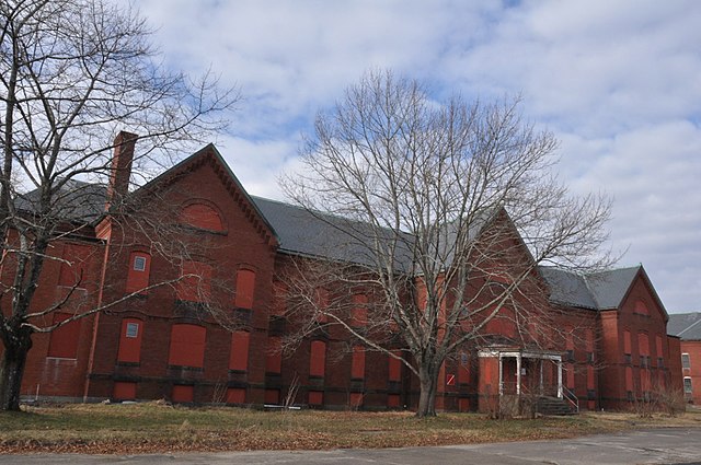 One of many abandoned buildings on the grounds of the former Medfield State Hospital