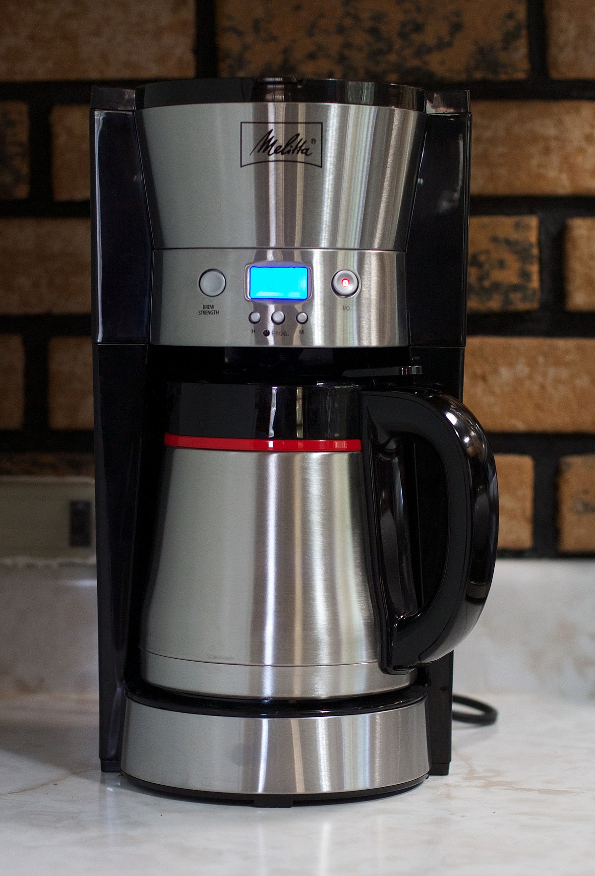 File:Brewing pour over coffee with kettle and scale.jpg - Wikimedia Commons