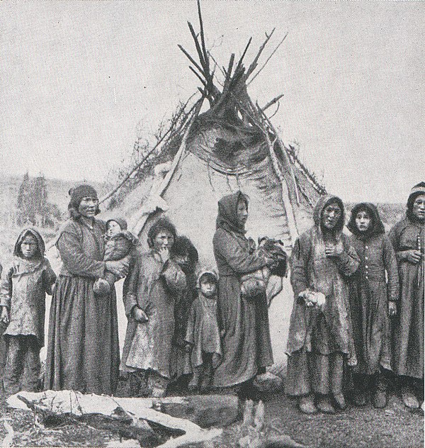 Naskapi women, wearing woolen and deerskin clothing, 1908