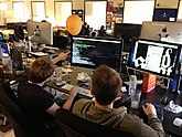 Software Engineers ("AKA: programmers") reviewing a program Pair Programming 3.jpg