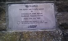 Plaque at Paisley Canal station commemorating the 1990 re-opening of the Paisley Canal branch line Paisley Canal line - re-opening plaque.jpg