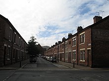 The majority of housing within the town is terraced, built for working-class families Parade Street, Barrow-in-Furness.jpg