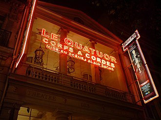 Neon signage for Le Quatuor's "Corps a cordes" act in Paris, 2009. Paris Variete, Le Quatuor Play Advert.jpg