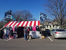Philadelphia Eagles-related merchandise being sold by a vendor near the Wynnewood station in the Philadelphia suburbs one day prior to the Super Bowl Philadelphia Eagles merchandise being sold in parking lot across from the Wynnewood SEPTA station ahead of Super Bowl LII 20180203 134348.jpg