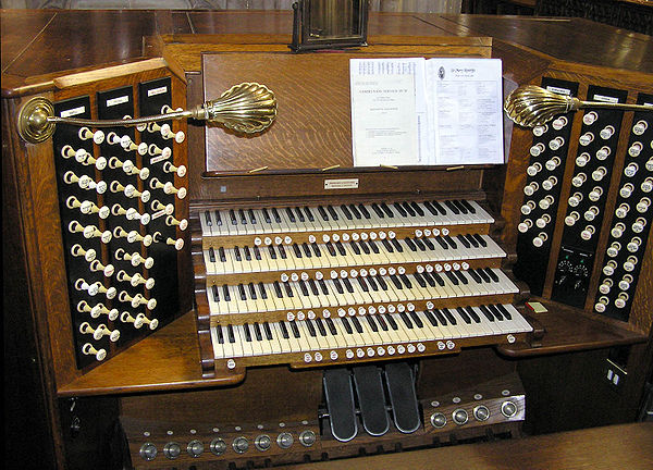 The organ console in St. Mary Redcliffe church in Bristol, England, with four manuals.