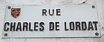 Plaque de rue à Bram au nom de Charles de Lordat.