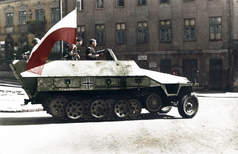 File:Polish freedom fighters whit a captured German Sd.Kfz. 251 during the Warzaw Uprising, Warzaw, Poland, 14 August 1944. (32084451847).png