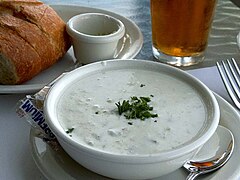 A cream-based New England chowder, traditionally made with clams and potatoes