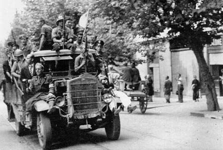 Italy, 1943. Italian partisans celebrating the liberation of Naples.