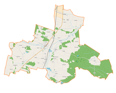 Mapa konturowa gminy Rozprza, blisko centrum na lewo znajduje się punkt z opisem „Rozprza”