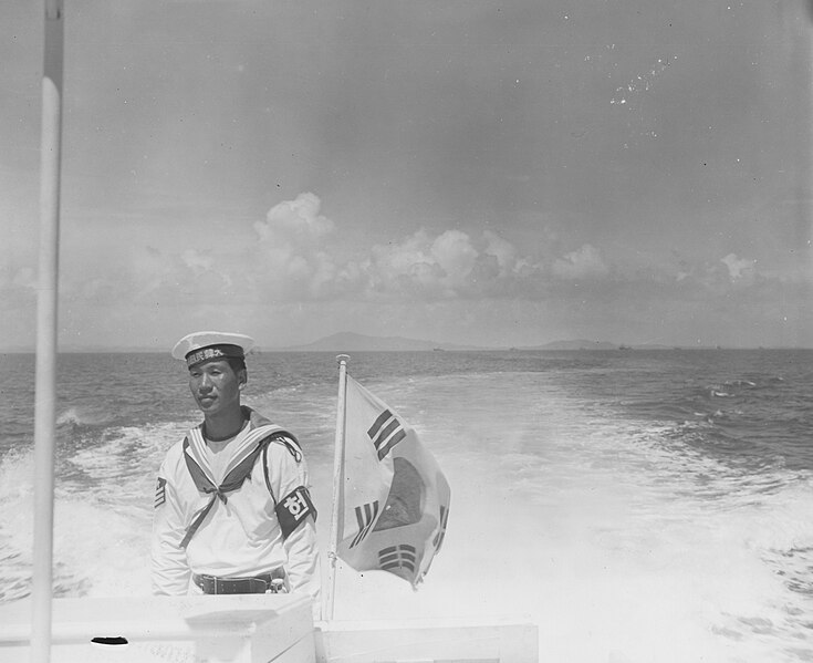 File:SC 334604 - A typical sailor, Korean Navy, stands aft on a launch during a demonstration of Korean Navy's strength in Inchon Harbor. (52205570210).jpg