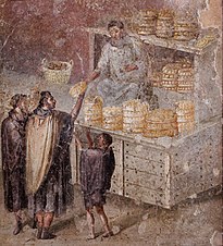 An ancient Roman politician redistributes bread Sale bread MAN Napoli Inv9071 n01.jpg