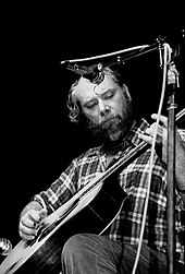 The guide's entry on John Fahey (pictured in 1984) helped revive the folk guitarist's career. Scan J Fahey 1 Paris 1984 web.jpg