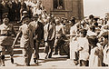 1937: Reception for the British High Commissioner, Sir Arthur Wauchope (at the entrance of the Raanana City Hall). The mayor, Mr. B. Ostrovsky, The Officer M. Schiff and the District Commissioner Mr. Cooperman are also participating at the ceremony. The onlookers are the citizens of Raanana.