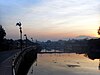 Cockerels, Lampang's emblem, watch sunset over the river.