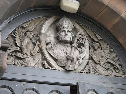 Depiction above the main door to St Aidan's Church, Leeds
