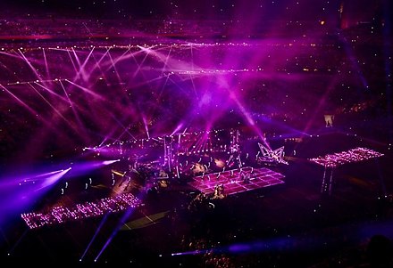 A long shot view of the halftime stage during the performance of "Just Dance"