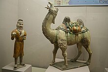 Tang dynasty sancai pottery camel with a Sogdian groom Tang Dynasty sancai pottery camel and man.JPG