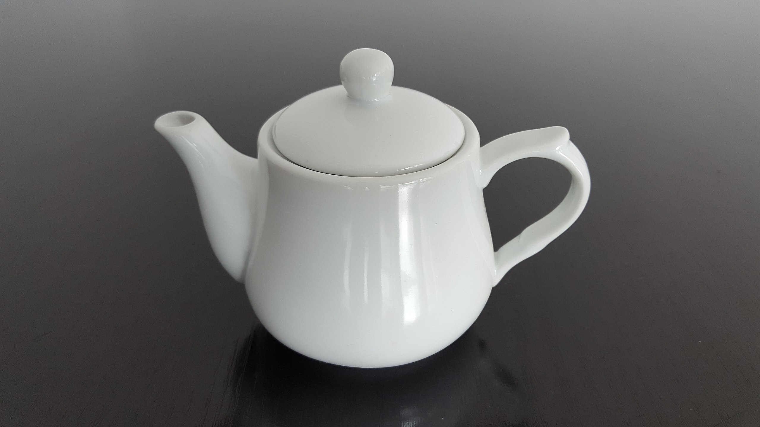 The Teapot and Cup are Insulated on a White Background. Stock Photo - Image  of black, design: 180170724