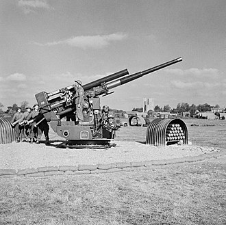 Static 3.7-inch HAA gun on a Pile Platform in action in Essex, 9 October 1944. The British Army in the United Kingdom 1939-45 H40431.jpg