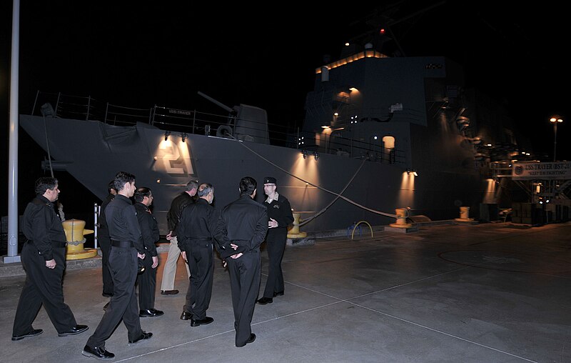 File:U.S. Navy Gunner's Mate 1st Class Jordan Melancon, middle ground right, a facilitator for Battle Stations 21, gives Saudi navy Rear Adm. Dawi Mohammed Saad al-Otaibi and six other Saudi naval officers a 121107-N-IK959-397.jpg