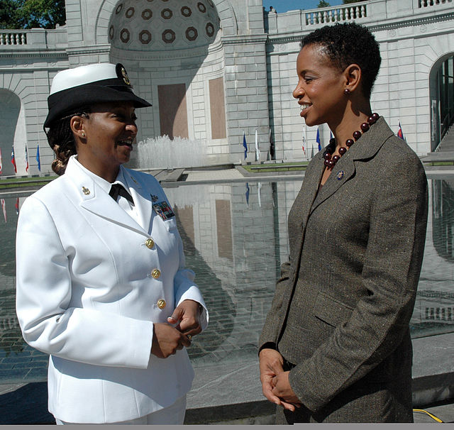 Edwards speaking with a U.S. Navy sailor in May 2009.