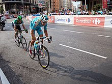 Etapa de 2013 de la Vuelta a España, que tiene convencionalmente a Madrid como término, con los ciclistas recorriendo la Gran Vía