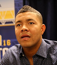 White Sox pitcher Jose Quintana talks to reporters at 2016 All-Star Game availability. (28393834022) (cropped).jpg