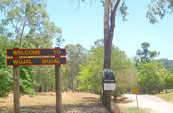 Sign welcoming people to Wujal Wujal, having travelled from the south along the Bloomfield Track