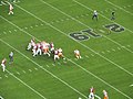 English: Clemson runs a play late in the fourth quarter at the 2019 College Football Playoff National Championship.